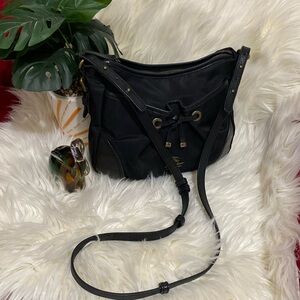 Burberry Crossbody, shoulder strap 24” can be adjusted sz 10”X2”X9”